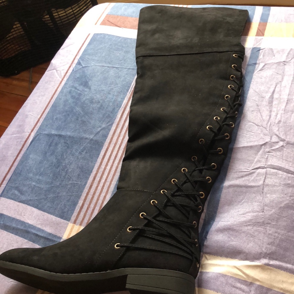 Lace-up over the knee boots.